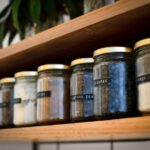 Spice Rack - a shelf filled with lots of different types of spices