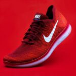 Specialty Shoes - unpaired red Nike sneaker