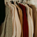 Closet Ventilation - brown and white coat hanged on rack