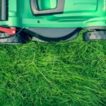 Lawn Mower - green and black lawnmower on green grass