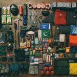 Camping Gear - assorted items on black textile
