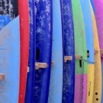 Surfboard Rack - assorted-color surfboard set