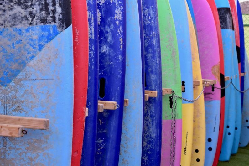 Surfboard Rack - assorted-color surfboard set